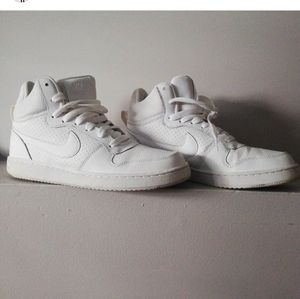 White Nike high top running shoes